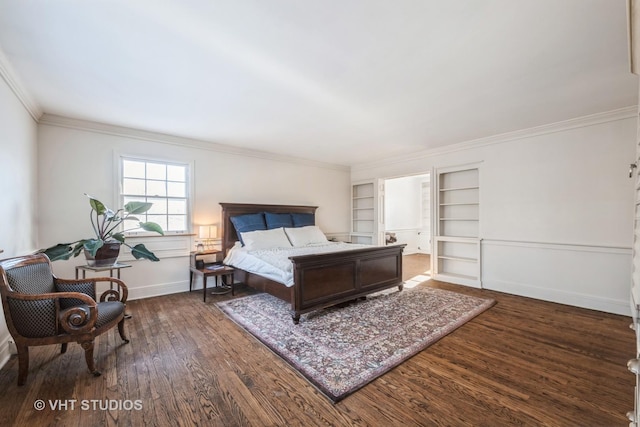 bedroom with dark wood-type flooring and crown molding