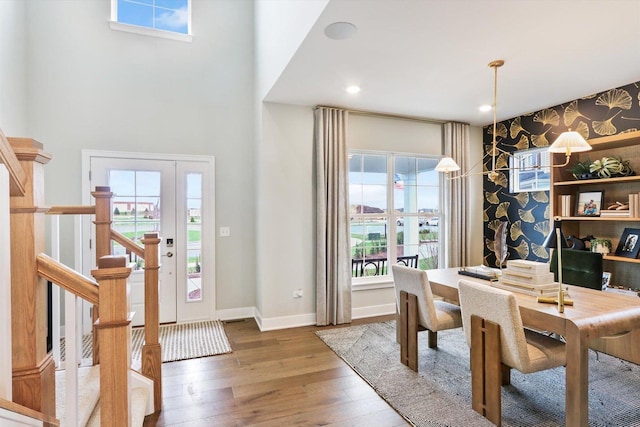 dining area with hardwood / wood-style floors