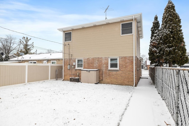 view of snow covered house