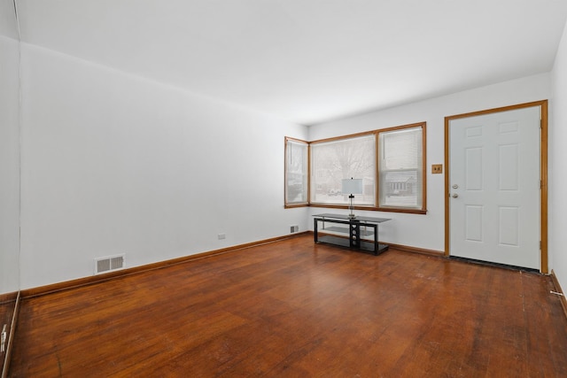 foyer entrance featuring hardwood / wood-style floors