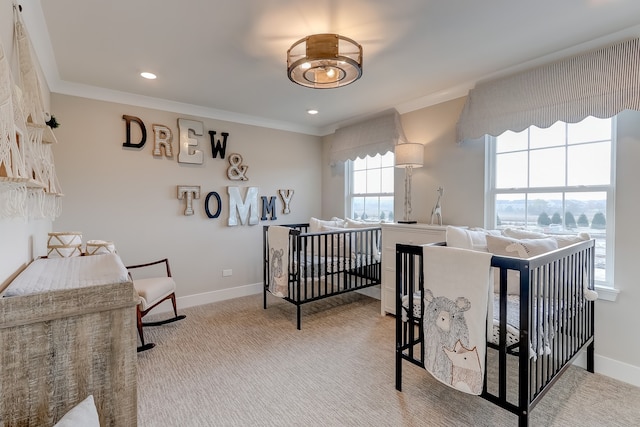 carpeted bedroom featuring crown molding