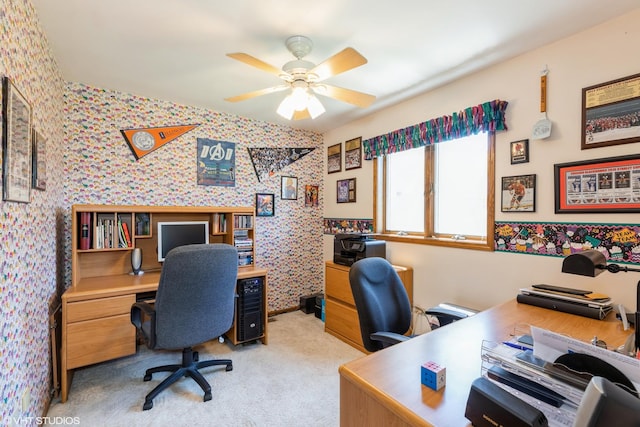 office space with light carpet, ceiling fan, and wallpapered walls