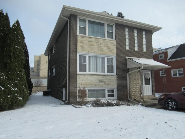 view of front of house with cooling unit