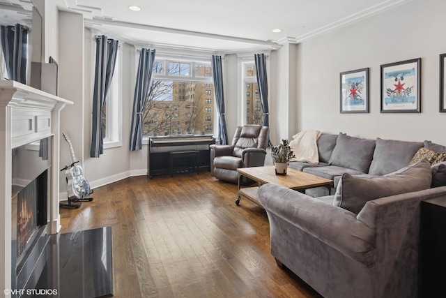 living room with ornamental molding and dark wood-type flooring