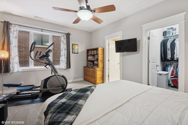 bedroom featuring ceiling fan, light carpet, and a closet