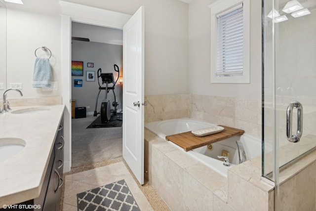 bathroom featuring tile patterned flooring, vanity, and independent shower and bath