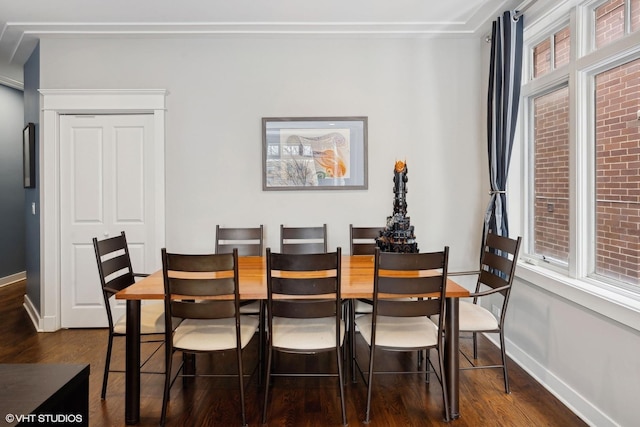 dining area featuring dark hardwood / wood-style flooring