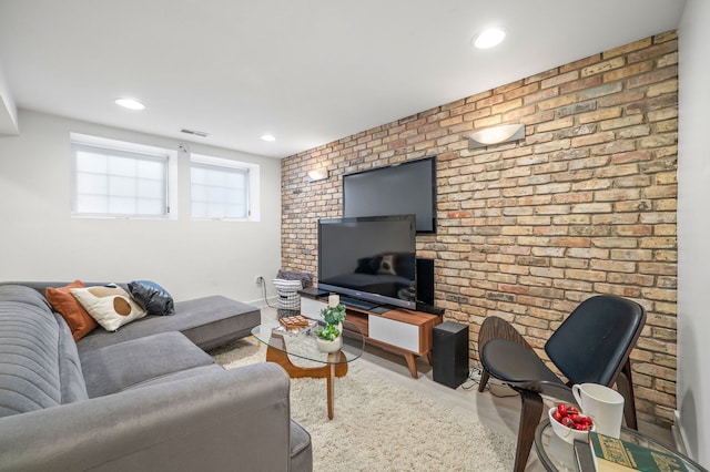 living room with brick wall