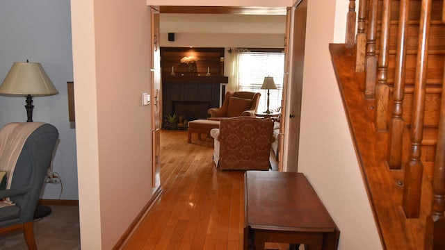 corridor featuring light hardwood / wood-style floors