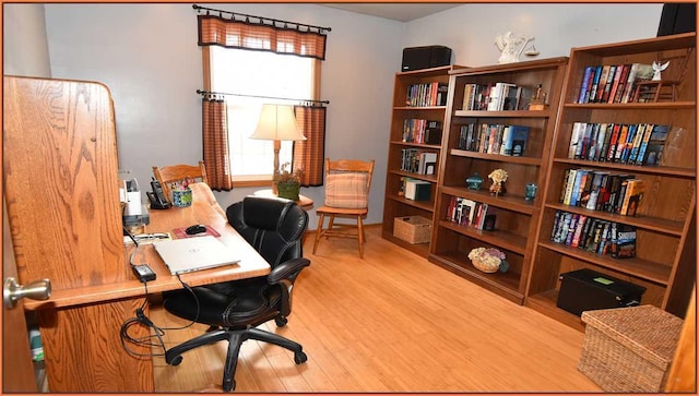 office area with hardwood / wood-style flooring