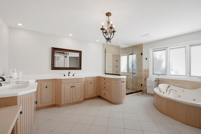 bathroom featuring vanity, an inviting chandelier, separate shower and tub, and tile patterned flooring