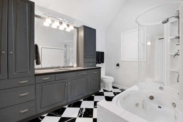 bathroom featuring toilet, vanity, and lofted ceiling