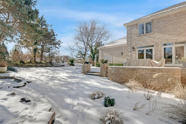 view of snowy yard