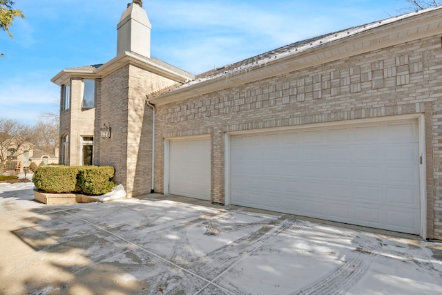 view of property exterior featuring a garage