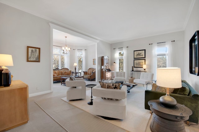 living room featuring light carpet, an inviting chandelier, and crown molding