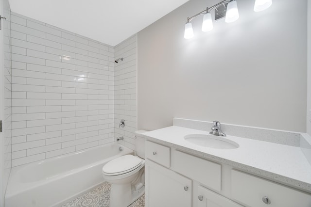 full bathroom with vanity, toilet, and tiled shower / bath combo