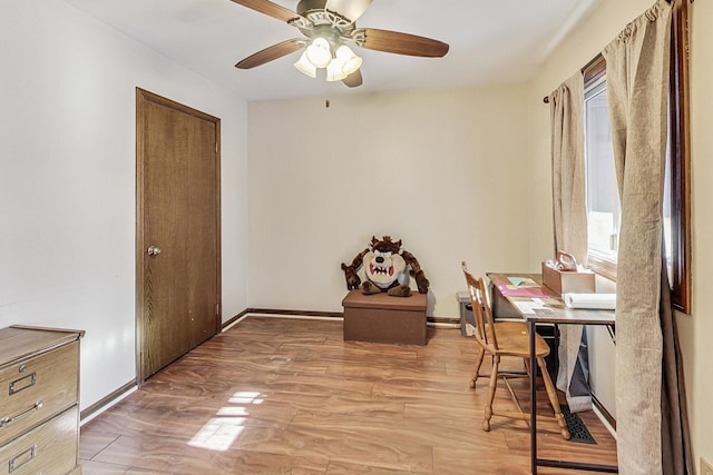 office featuring ceiling fan and hardwood / wood-style floors