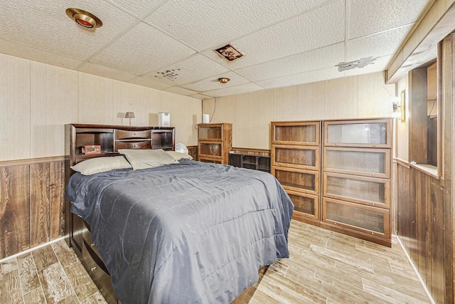 bedroom featuring a paneled ceiling