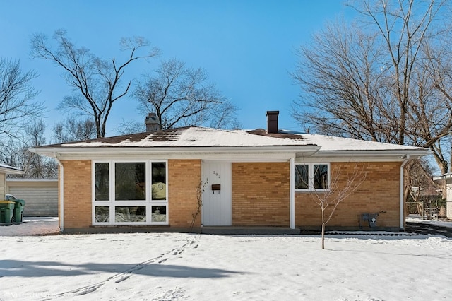 view of snow covered property