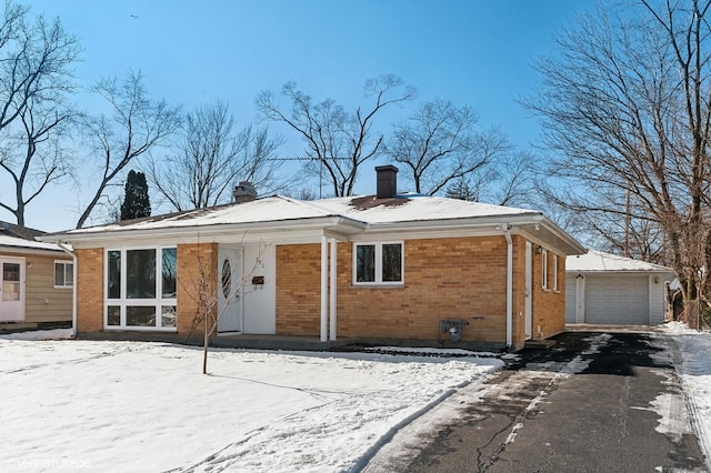 view of snow covered house