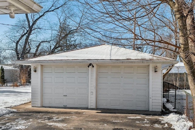 view of snow covered garage