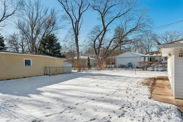 view of yard covered in snow