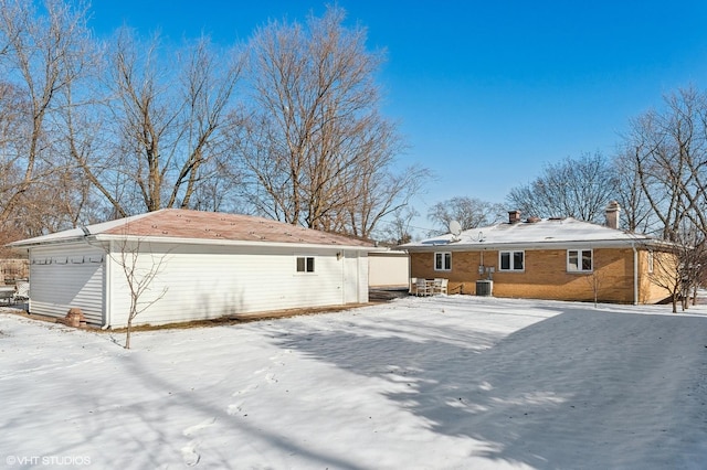 view of snow covered house