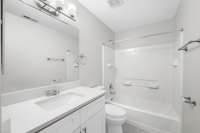 full bathroom with bathtub / shower combination, vanity, toilet, and tile patterned flooring