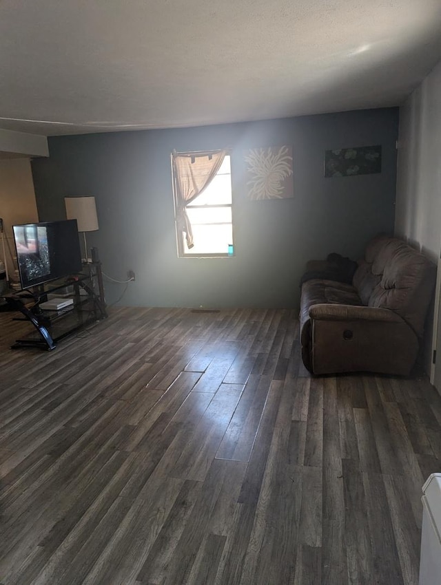 living room with dark hardwood / wood-style floors