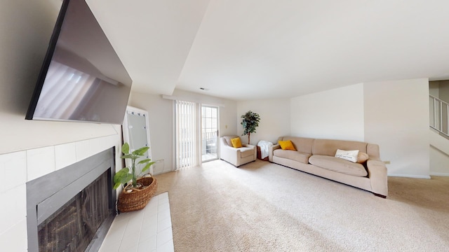 living room featuring light carpet