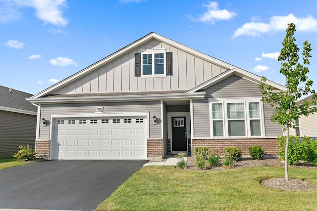 craftsman-style home with a front lawn and a garage