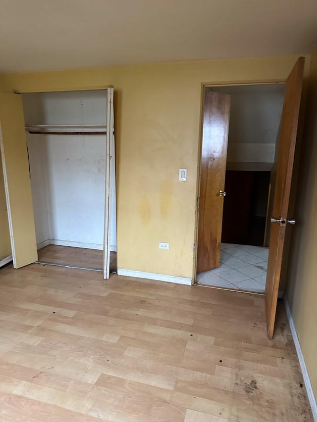 unfurnished bedroom featuring light hardwood / wood-style floors