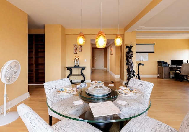 dining space featuring hardwood / wood-style floors