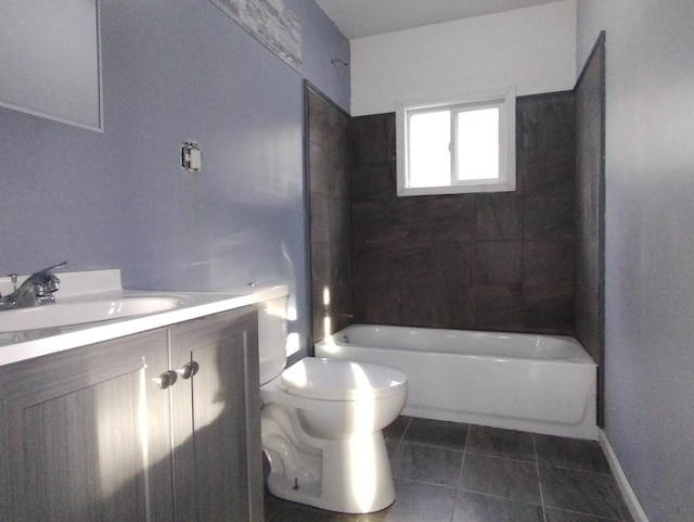 full bathroom featuring tile patterned floors, vanity, toilet, and tiled shower / bath combo