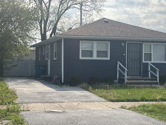 16529 Green St, Harvey, IL 60426 - view of front of house featuring roof with shingles