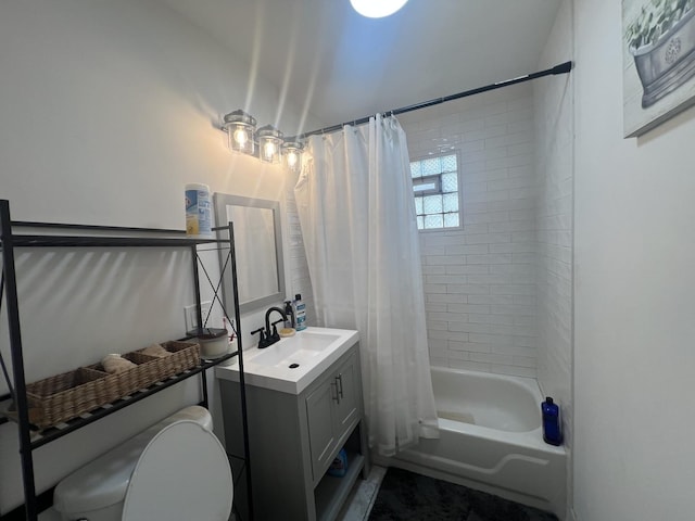 full bathroom with shower / tub combo with curtain, vanity, and toilet