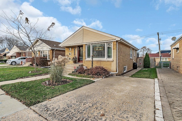 bungalow with a front yard