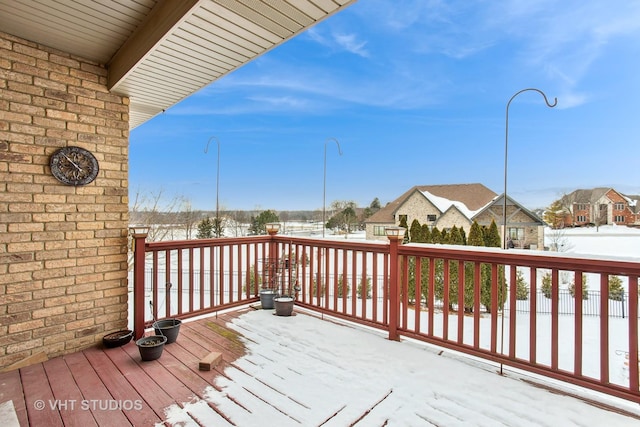 view of snow covered deck