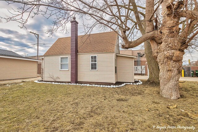 additional living space featuring light hardwood / wood-style floors and vaulted ceiling