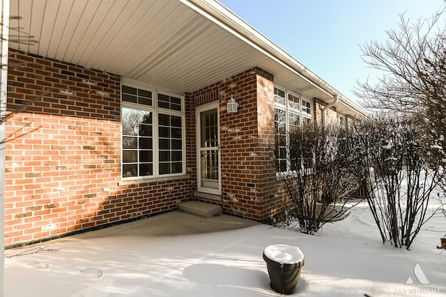 view of snow covered patio