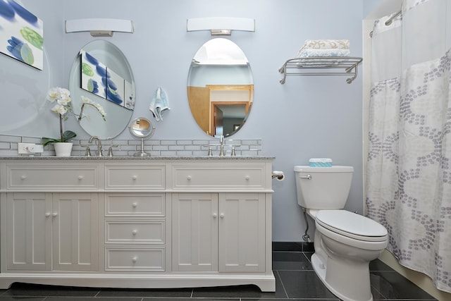 bathroom featuring a shower with curtain, vanity, tile patterned flooring, and toilet