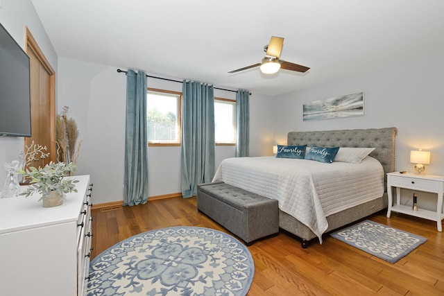 bedroom featuring ceiling fan and light wood-type flooring