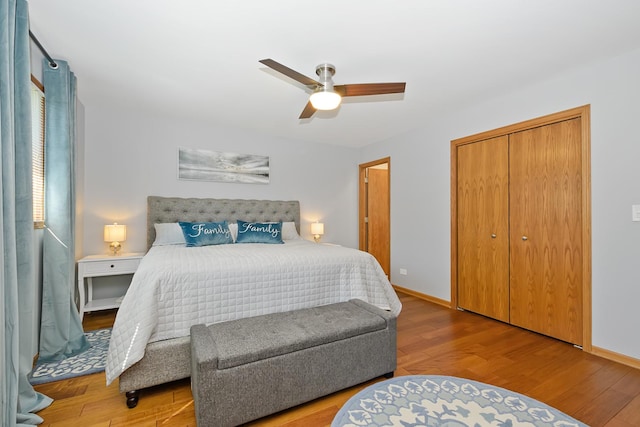 bedroom with a closet, ceiling fan, and light wood-type flooring