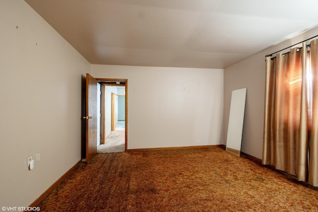 spare room with light carpet