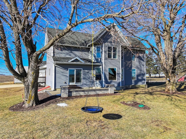 view of front of home with a front yard