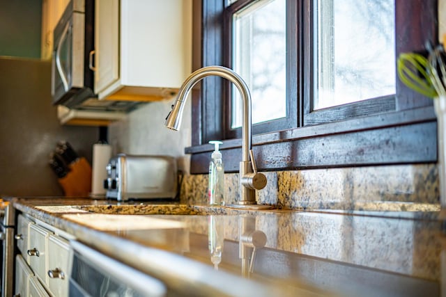 interior details featuring sink