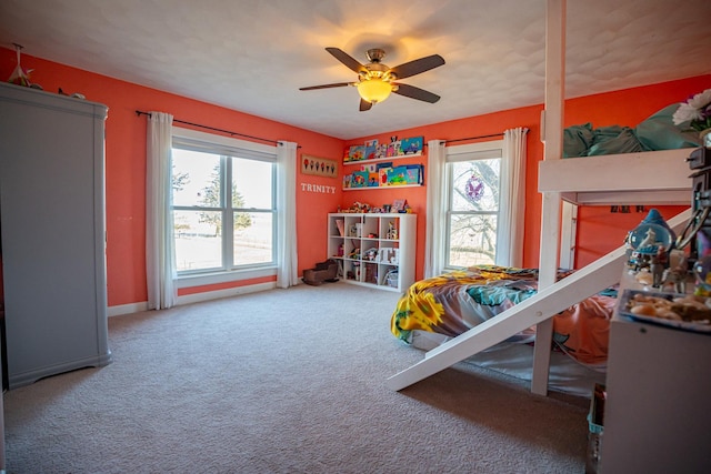 bedroom with carpet floors and ceiling fan