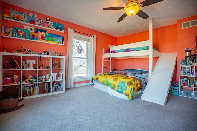 carpeted bedroom featuring ceiling fan