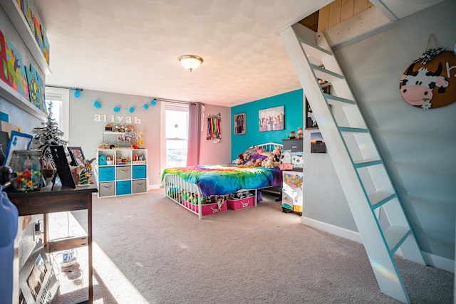 carpeted bedroom with multiple windows