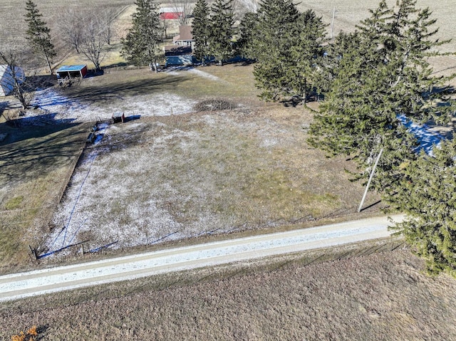 birds eye view of property featuring a rural view